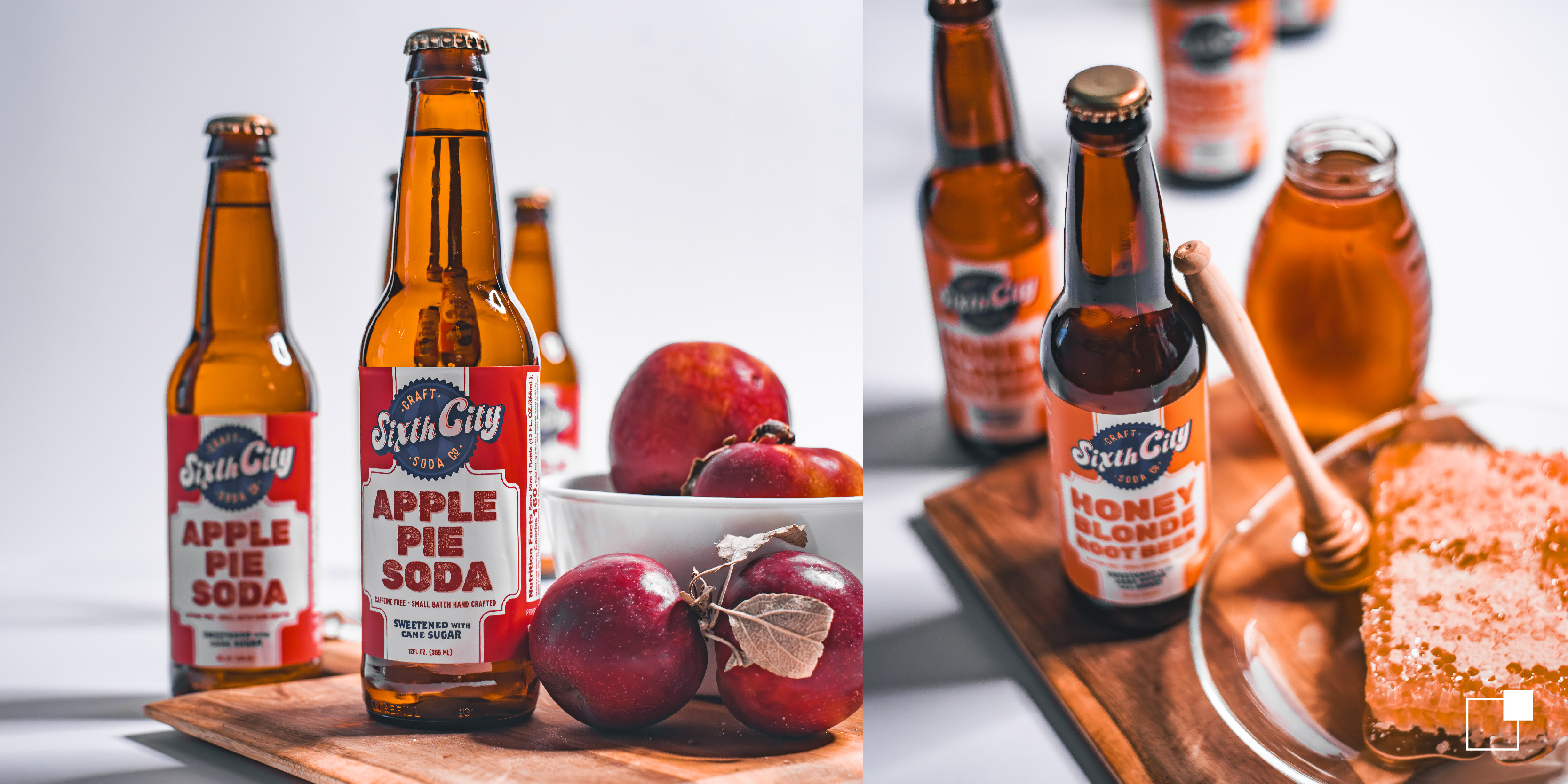 Sixth City Soda bottles next to apples and maple syrup