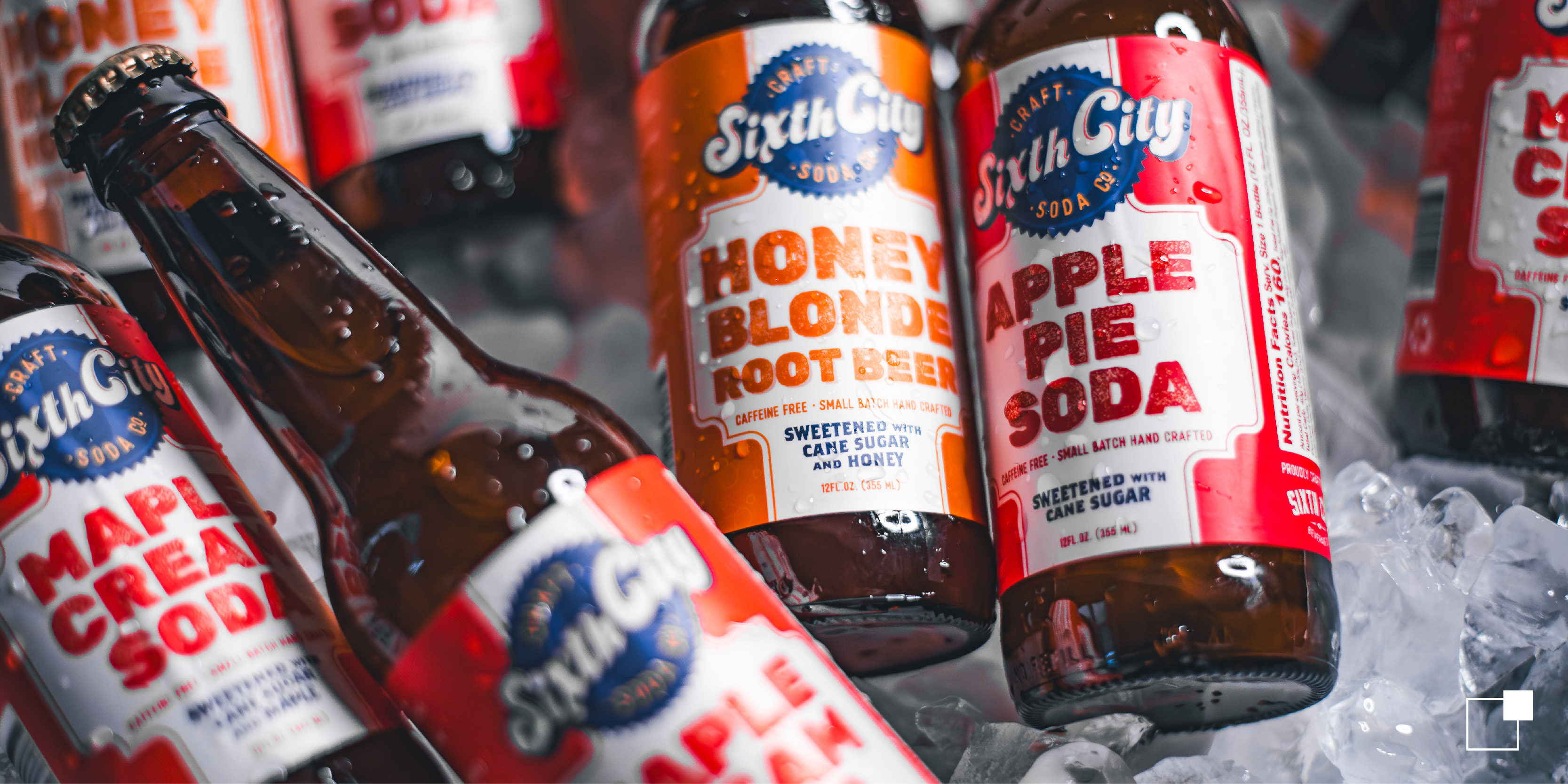 Sixth City Soda bottles chilling in a tub of ice